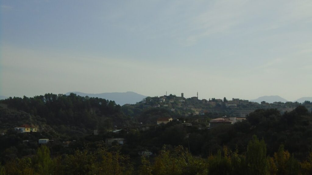 Badia a Passignano abbey hilltop view afternoon